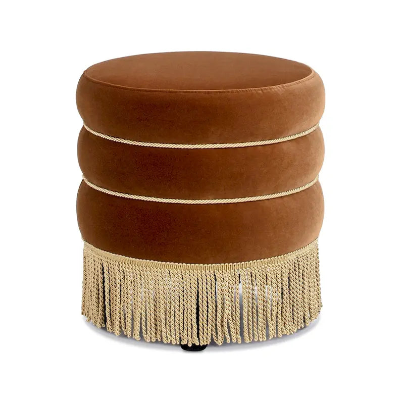 Pouf rond tapissé avec franges en fil doré