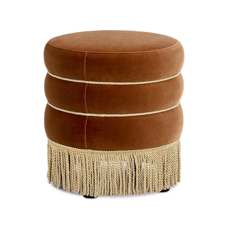 Pouf rond tapissé avec franges en fil doré