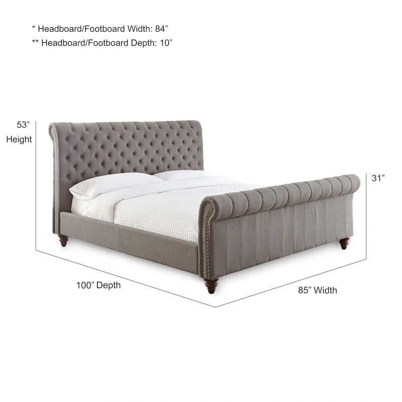 Rembourrage luxueux recouvrant la tête et le pied de lit à volutes